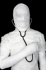 Image showing Man in costume mummy with stethoscope