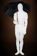 Image showing Mummy with umbrella