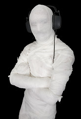 Image showing Man in bandage with ear-phones