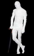 Image showing Man in costume mummy and umbrella