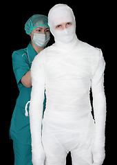 Image showing Man in bandage and nurse