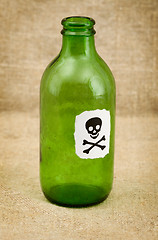 Image showing Bottle with sticker - skull and crossbones