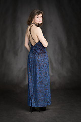 Image showing The girl in a dark blue evening dress