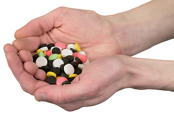 Image showing Multicolore tablets on hand