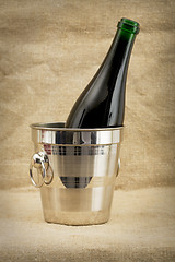 Image showing Champagne bottle in metallic bucket