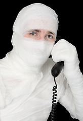 Image showing Mummy-businessman calling on phone