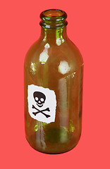 Image showing Green bottle with skull and crossbones