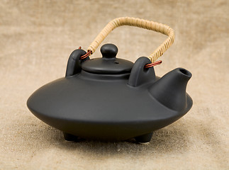 Image showing Black ceramic chinese teapot