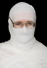 Image showing Sorrowful bandaged men in spectacles