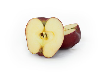 Image showing The cut apple on a white