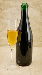 Image showing The champagne bottle and glass