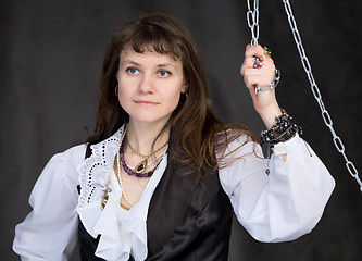 Image showing The girl - pirate and metal chain