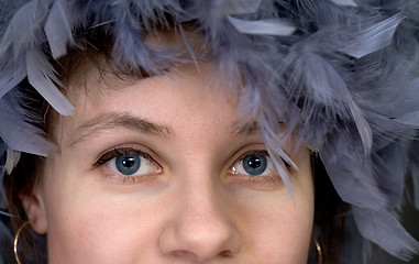 Image showing Portrait of the girl with a boa closeup