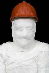 Image showing Bandaged worker in helmet