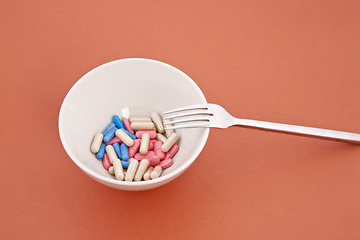 Image showing a meal of different tablets