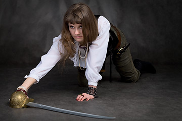 Image showing Girl on all fours with rapier