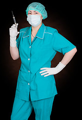 Image showing Nurse with syringe in hand