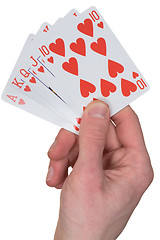Image showing Playing card with heart on hand