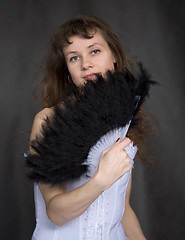 Image showing Portrait of the girl with a fan