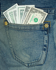 Image showing Dollars in hip-pocket on jeans