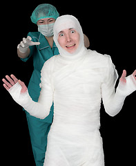 Image showing Man in bandage and nurse