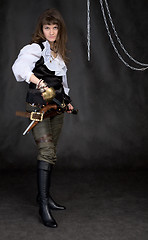 Image showing The girl - pirate with a sabre in hands