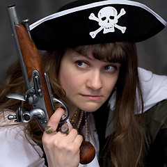 Image showing Girl - pirate with pistol in hand