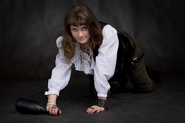 Image showing The funny girl - pirate with bottle