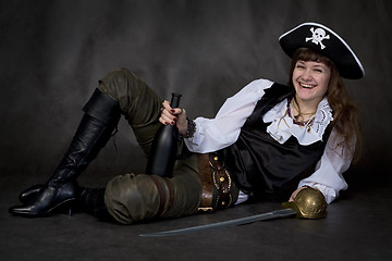 Image showing Girl - pirate with rapier and bottle