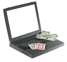 Image showing Laptop with playing card and money