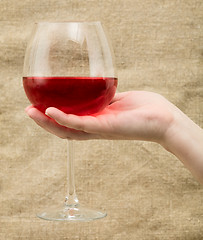 Image showing Wineglass on hand