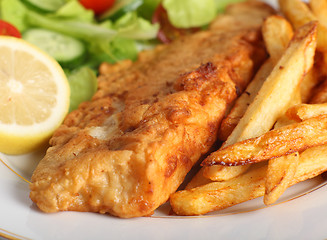 Image showing Battered fish with chips and salad