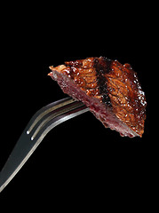Image showing Steak on fork