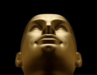 Image showing Gold mannequin head looking up