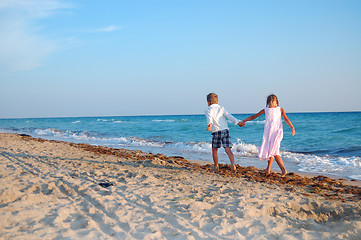 Image showing kids walking along the beach together