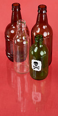 Image showing Four glasses bottle