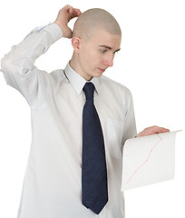 Image showing Perplexed guy with the financial graph in hands