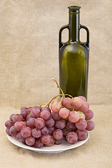 Image showing Bottle of wine and grape