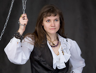 Image showing The girl - pirate and metal chain