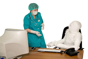 Image showing The bandaged boss and nurse