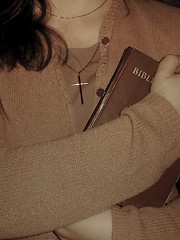 Image showing Holding the Bible