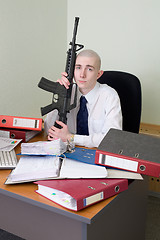 Image showing Accountant armed with a rifle