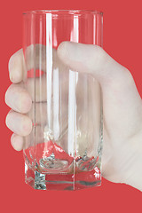 Image showing Glass of water on hand in glove