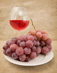 Image showing Goblet and grapes
