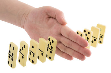 Image showing Bones of dominoes and hand