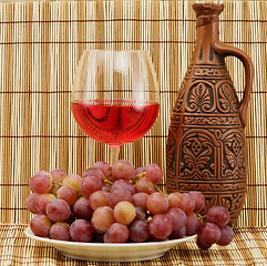 Image showing Bright still life with wine