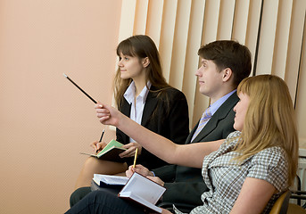 Image showing Group of businessmen sitting on armchairs