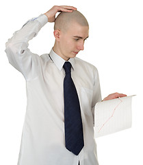 Image showing Perplexed guy with the financial graph in hands