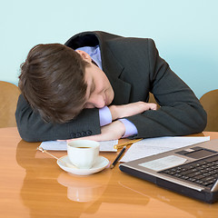 Image showing Businessman has fallen asleep sitting at meeting