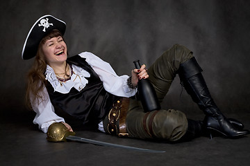 Image showing Girl - pirate with rapier and bottle